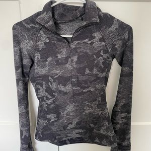Lulu quarter zip camo top.  Excellent condition.